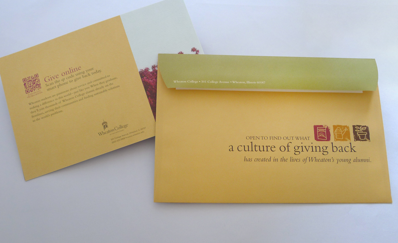 back side of outer envelope and booklet insert. Text reads "open to find out what a culture of giving back has created in the lives of Wheaton's young alumni."